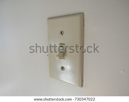 View of light switch on wall