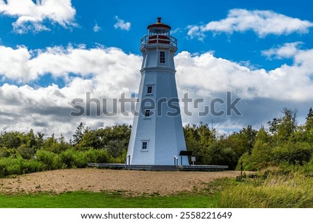 A view of the lighthouse by the Confederation bridge, Prince Edward Island, Canada in the fall