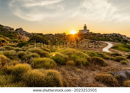 View of lighthouse in Capo Testa at sunset, Sardinia.