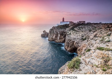 View of the lighthouse and cliffs at Cape St. Vincent at sunset. Continental Europe's most South-western point, Sagres, Algarve, Portugal.
