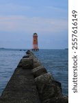 View of the lighthouse at the port of Sunda Kelapa, the gateway to the port of Jakarta Indonesia. Founded in the mid-19th century.