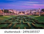 View of Lisbon Marquis of Pombal Square seen from the Eduardo VII Park in the evening twilight. Lisbon, Portugal