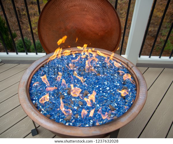 View Lit Fire Pit Blue Crystals Stock Photo Edit Now 1237632028