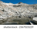 View of a little glacier lake in the famous Alta Via di Neves, Zillertal alps, Italy
