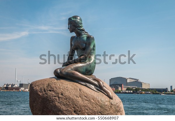 View\
of the Little mermaid statue in Copenhagen\
Denmark