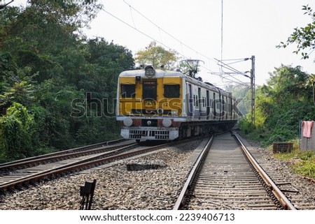 A view of local train of Eastern Railway in Indian Railway system running in city Kolkata, West Bengal, India