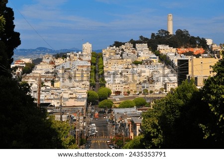 A view of Lombard Street, Coit Tower and Telegraph Hill from the Russian Hill district, San Francisco, California, USA.