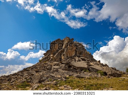 View of a lonely rock on a sunny summer day. Gorny Altai, Russia