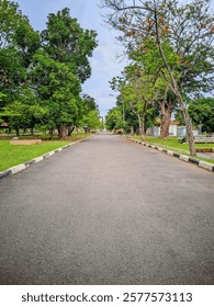 a view of a long, straight empty road