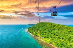 View Of Longest Cable Car Ride In The World, Phu Quoc Island, Vietnam, Sunset Sky. Below Is Seascape With Tropical Islands And Boats.