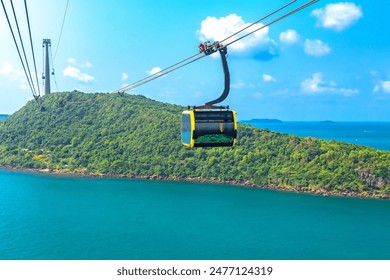 View of longest cable car ride in the world, Phu Quoc island, Vietnam. Below is seascape with tropical islands and boats. - Powered by Shutterstock