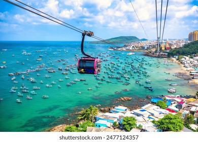 View of longest cable car ride in the world, Phu Quoc island, Vietnam. Below is seascape with tropical islands and boats. - Powered by Shutterstock