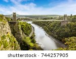 A view looking up the Avon gorge towards Bristol with the Clifton Suspension bridge across the gorge it on a bright Autumn day
