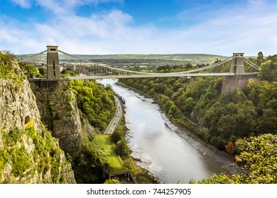 A view looking up the Avon gorge towards Bristol with the Clifton Suspension bridge across the gorge it on a bright Autumn day