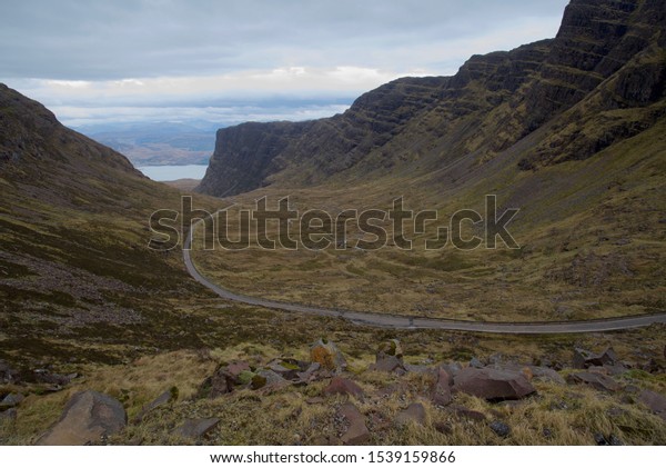 View looking down and north into the Bealach na\
ba, a notorious pass in Wester Ross, on the North Coast 500 route\
in Scotland