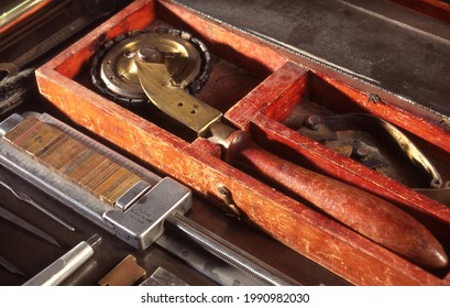 View Looking Down On A Table Of Various Book Binding Tools For Use By Hand