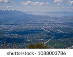 A view looking down on the winding roads and small city that is salt lake city in utah. 