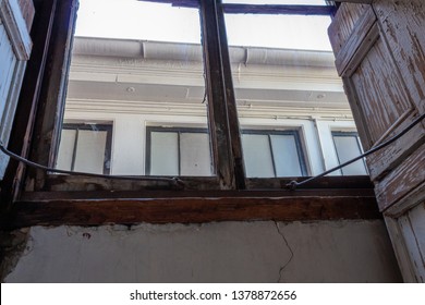 View Looking Up Out Of A Clerestory Window, Heavy Water Damage Evident, Horizontal Aspect