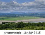 A view looking over the River Kent estuary near Arnside, to the Lake District National Park, in Cumbria, England.