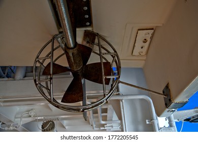 View Looking Upward To The Propeller Of A Rescue Boat Hanging Overhead On A Cruise Ship