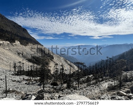 A view of a loop and mountain landscape. Location sela pass near sela tunnel tawang district Arunachal Pradesh. Photo taken December 2024