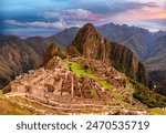 View of the lost inca city Machu Picchu, agriculture terraces at sunset. Peru