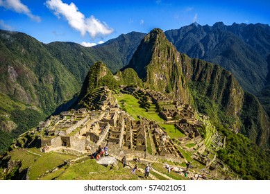 View Of The Lost Incan City Of Machu Picchu Near Cusco, Peru. Machu Picchu Is A Peruvian Historical Sanctuary. People Can Be Seen On Foreground.