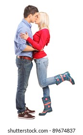 A View Of A Loving Couple Kissing Isolated On White Background