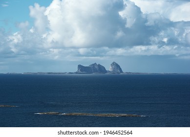 View From Lovund Hills To The Helgeland Archipelago In The Norwegian Sea On Sunny Summer Afternoon. Silhouette Of Træna Island On The Background