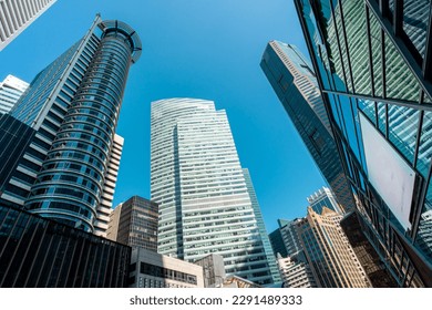 View low angle Singapore central business district, a modern financial building district area in Raffles Place, Singapore. - Powered by Shutterstock