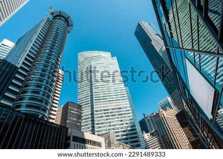 View low angle Singapore central business district, a modern financial building district area in Raffles Place, Singapore.