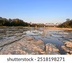 A view of the low water in the Maumee River in Grand Rapids, Ohio. Taken near sunset in mid September.