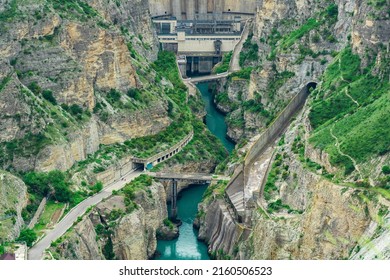 View Of The Lower Part Of The Arch Dam With A Spillway In The Canyon