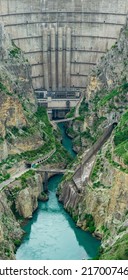 View Of The Lower Part Of The Arch Dam With A Spillway In The Canyon