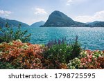 View of Lugano Lake and Monte San Salvatore from the Parco Ciani, Switzerland.