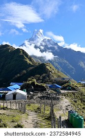 View of the Machapuchare peak in the morning, with the Mardi Himal High Camp, elevation 3550m, in the foreground, Nepal