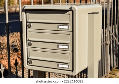 View of mailbox near fence in city, closeup - Shutterstock ID 2282616081