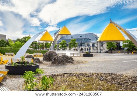 View to main square with fountain and yellow lanterns. Rakvere, Estonia