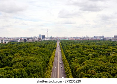 view of main street ( 17th of June Street / Strasse des 17. Juni )  and Berlin city: tv tower, Brandenburg gate, reichstag, Tiergarten and cathedral dome