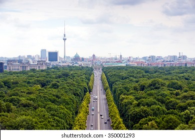 View of main street and Berlin city: tv tower, Brandenburg gate, reichstag, Tiergarten and cathedral dome