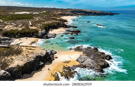 View of the Malhao beach in Vila Nova de Milfontes, Alentejo, Portugal.