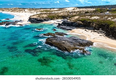 View of the Malhao beach in Vila Nova de Milfontes, Alentejo, Portugal.
