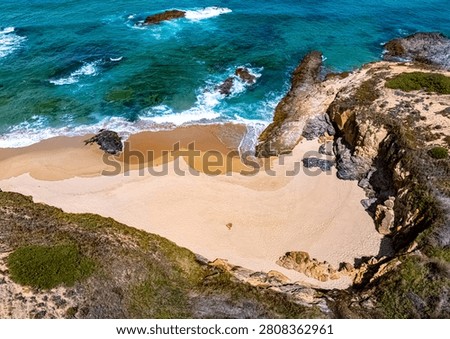 View of the Malhao beach in Vila Nova de Milfontes, Alentejo, Portugal.