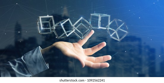 View of a Man holding a 3d rendering blockchain cube isolated on a background