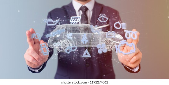 View of a Man holding  Smartcar icon around an automobile 3d rendering - Shutterstock ID 1192274062