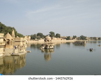 A view of a man made lake and the structures in the middle