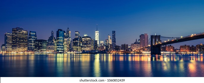 View of Manhattan by night, NYC. - Powered by Shutterstock