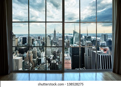 View of Manhattan New York City Skyline Buildings from High Rise Window - Beautiful Expensive Real Estate overlooking Empire State Building and Skyscrapers in Gorgeous Breathtaking Penthouse Cityscape - Shutterstock ID 138528275