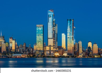 View to Manhattan skyline from Weehawken Waterfront in  Hudson River at sunset. - Shutterstock ID 1460300231