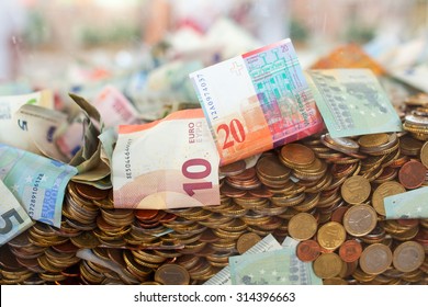 View Of Many Paper Money Inside The Plexiglass Cube For Fundraising 